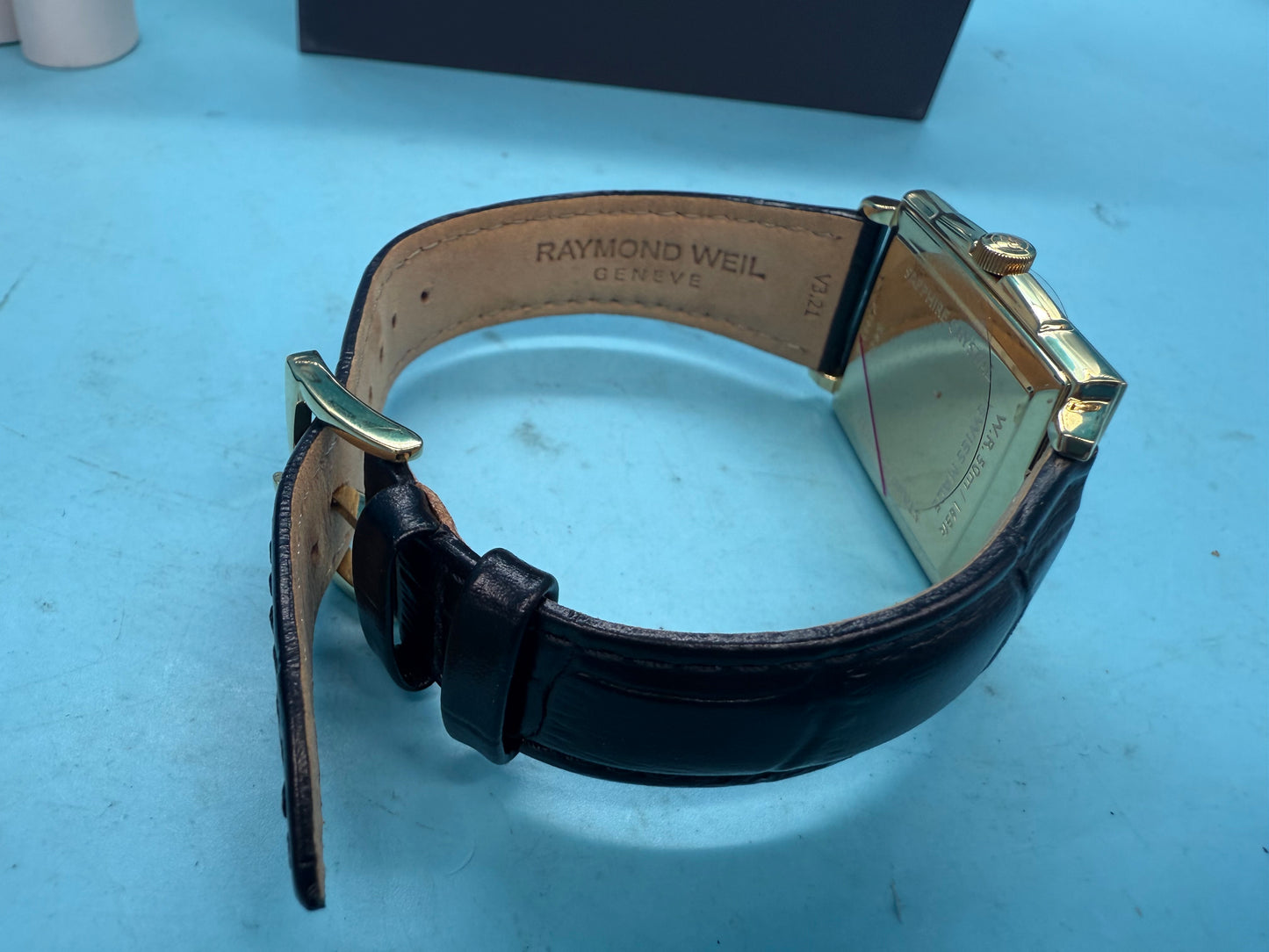 Raymond Weil Toccata watch back case showing back of strap and logo