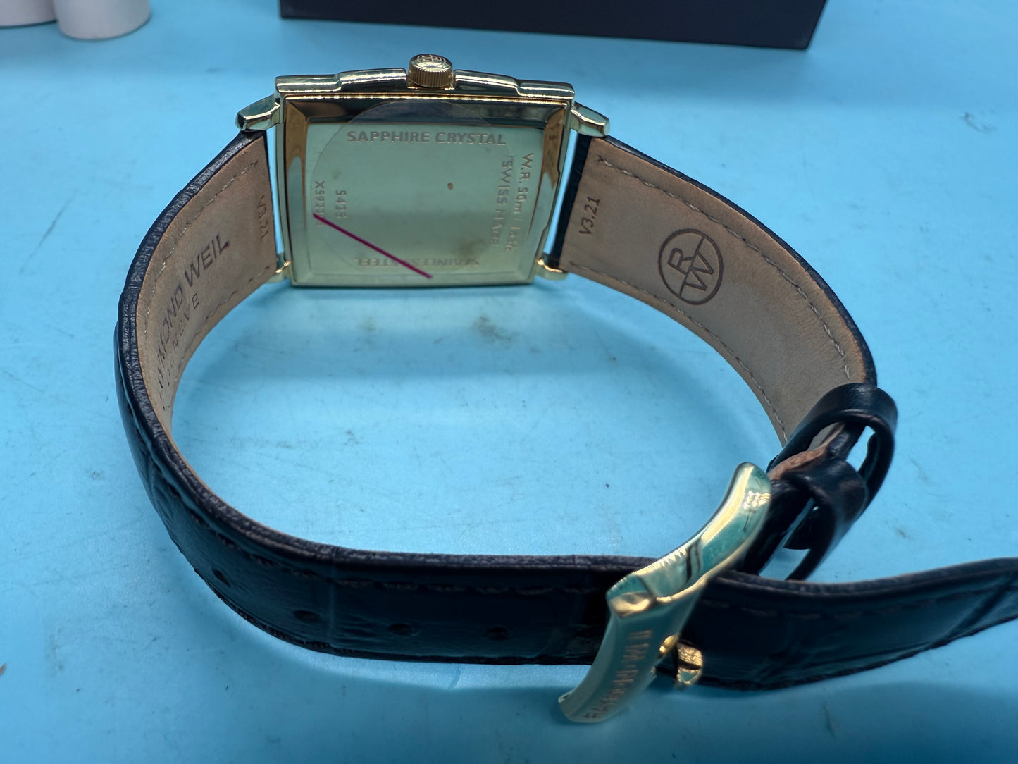 Raymond Weil Toccata watch back case showing Swiss quartz movement and water resistance specifications